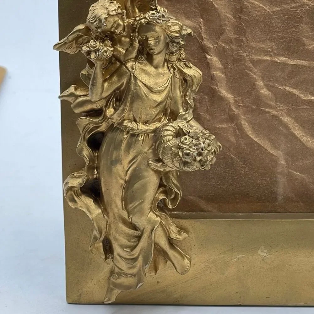 Vintage 1990 Gold colored Goddess & Cherub photo frame .